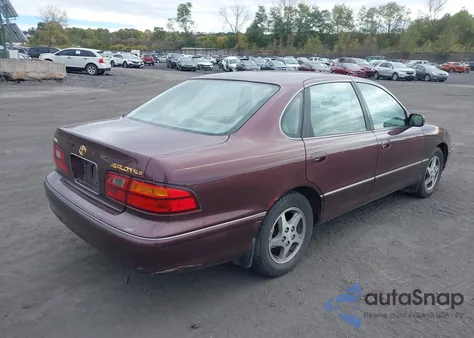 1999 Toyota Avalon Xls z USA, uszkodzony, nr VIN 4T1BF18BXXU299725